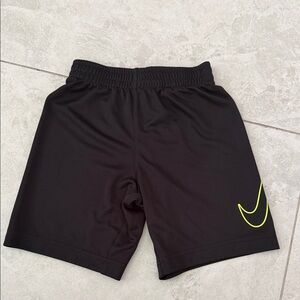 Nike Black Athletic Shorts with Neon Yellow Swoosh